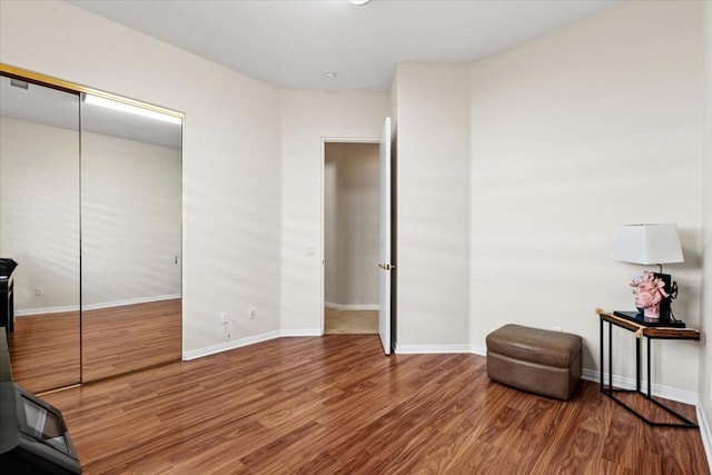 living area with wood-type flooring