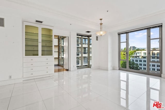 view of tiled spare room