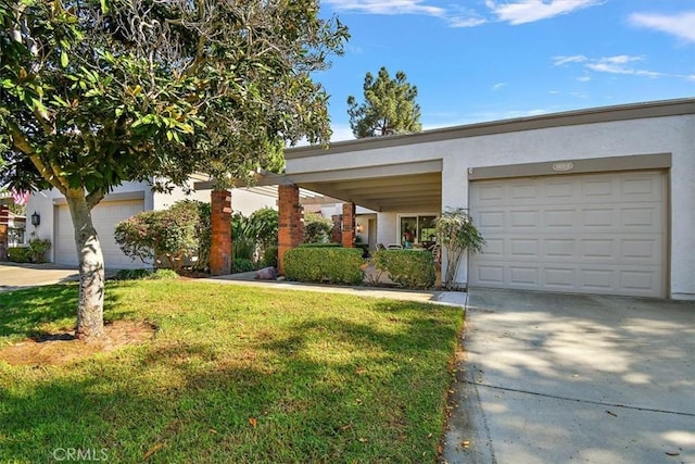 view of front of house featuring a garage and a front yard