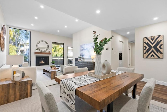 dining space featuring light wood-type flooring