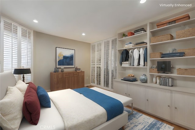 10409 Riverside Dr Unit 204, Toluca Lake, CA 91602 - bedroom with recessed lighting and light wood-style flooring