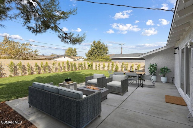 view of patio / terrace featuring a fire pit