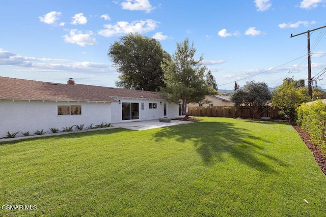 view of yard with a patio area