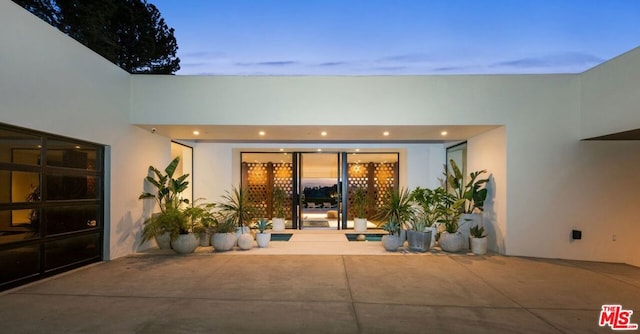 view of patio terrace at dusk