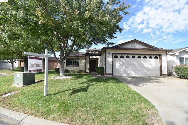 ranch-style house with a front lawn and a garage