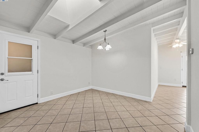 tiled spare room featuring vaulted ceiling with beams and ceiling fan with notable chandelier