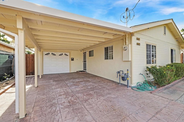 view of front of property featuring a carport