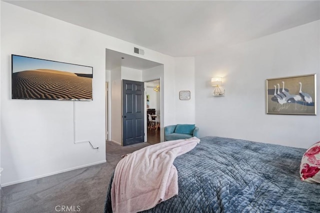 bedroom featuring dark carpet