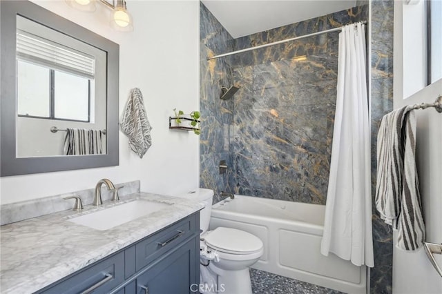 full bathroom featuring vanity, toilet, and shower / bathtub combination with curtain