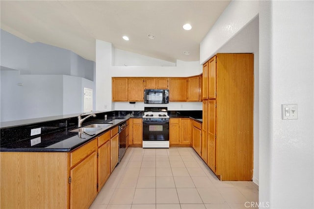 kitchen with high vaulted ceiling, black appliances, sink, dark stone countertops, and light tile patterned floors