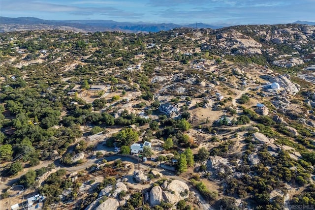 drone / aerial view featuring a mountain view