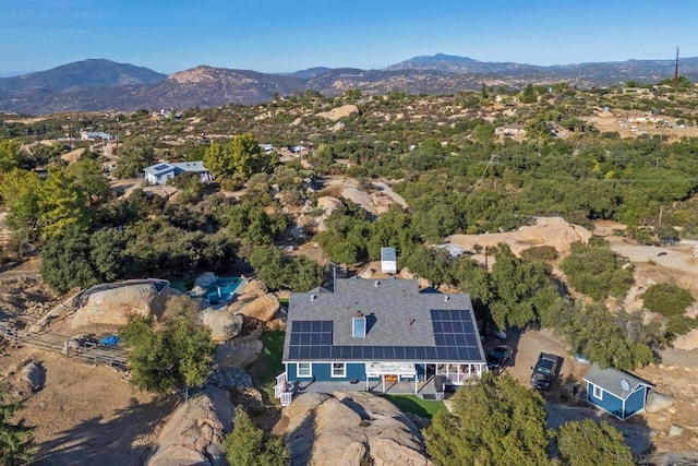 bird's eye view with a mountain view