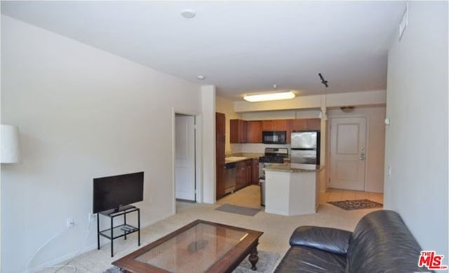 living room featuring light colored carpet