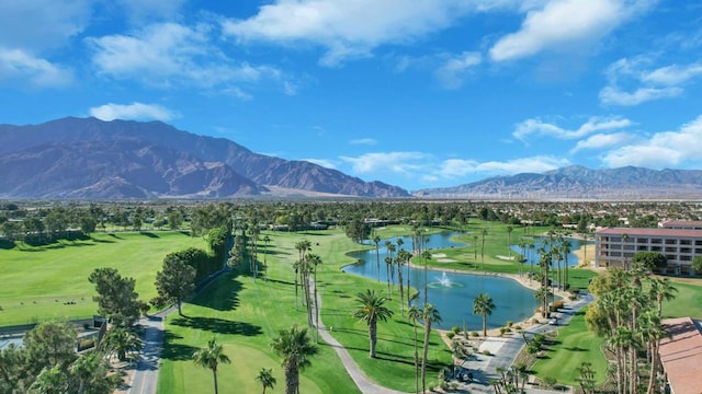 view of community with a water and mountain view