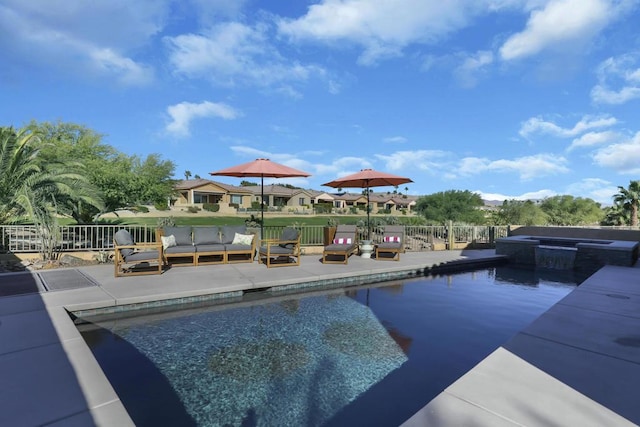 view of swimming pool with an outdoor living space, an in ground hot tub, and a patio