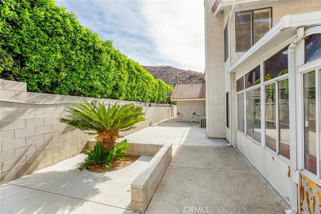 view of patio with a mountain view