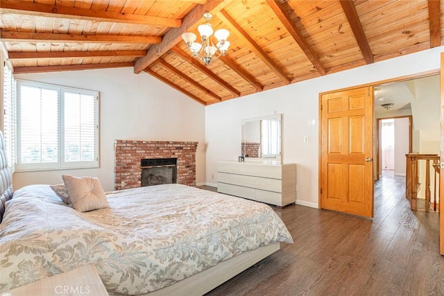 bedroom featuring a brick fireplace, wood ceiling, dark wood-type flooring, a notable chandelier, and vaulted ceiling with beams