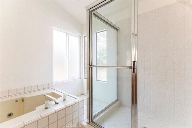 bathroom with independent shower and bath and vaulted ceiling