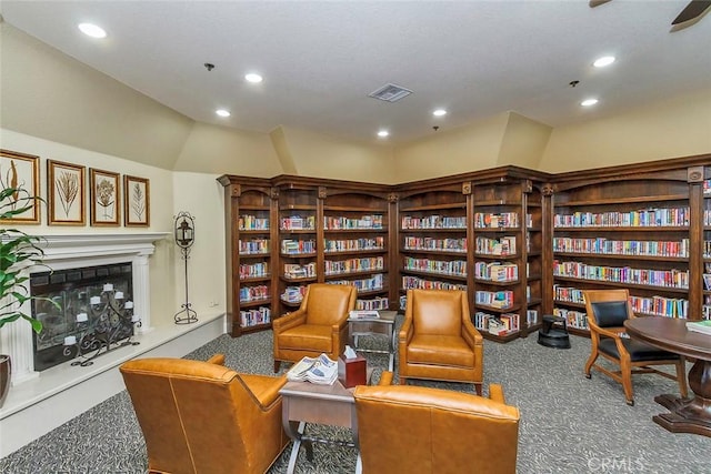 sitting room featuring carpet floors