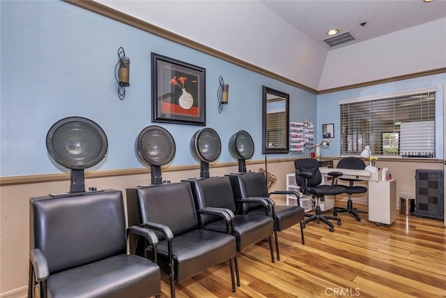 miscellaneous room with light hardwood / wood-style flooring, lofted ceiling, and wine cooler