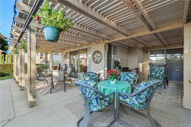 view of patio featuring a pergola