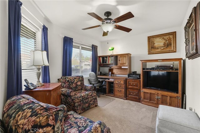 office area featuring ceiling fan and carpet flooring