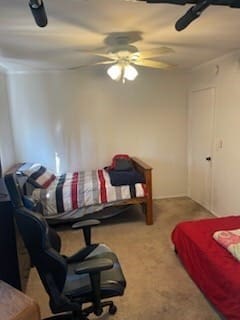 bedroom with carpet and ceiling fan