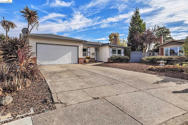 single story home featuring a garage