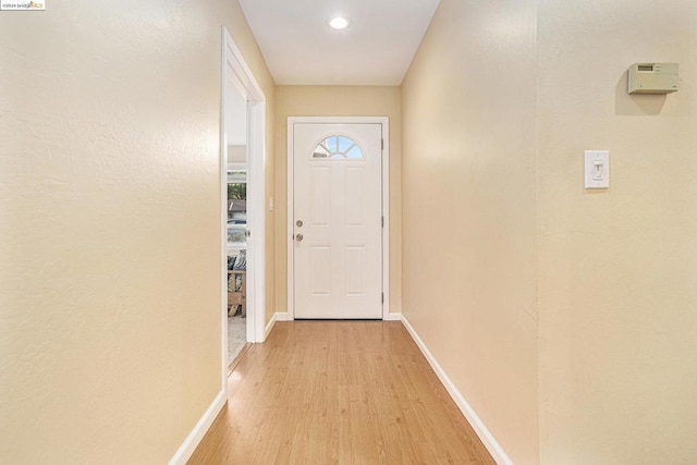 doorway featuring light hardwood / wood-style floors