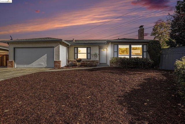 ranch-style house with a garage