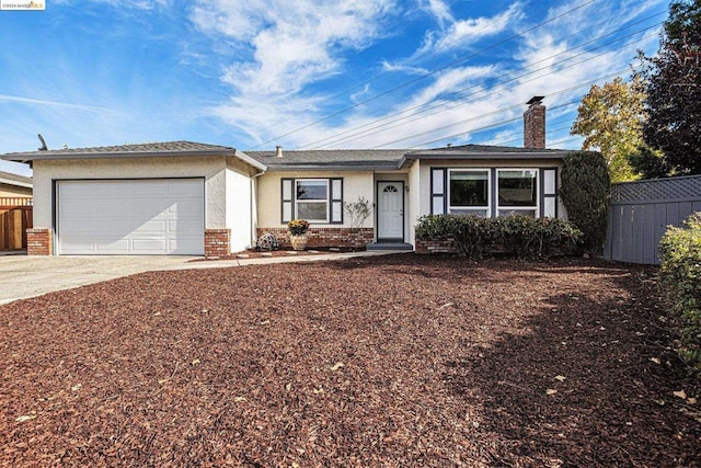 ranch-style home with a garage