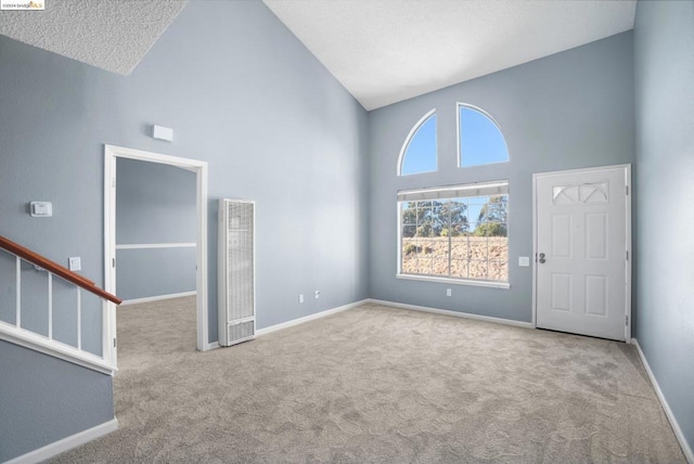 interior space with high vaulted ceiling