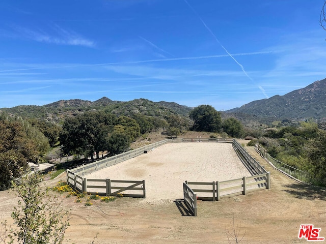 view of mountain feature with a rural view