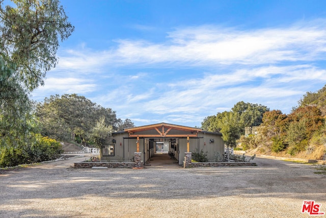 view of front of house featuring a carport