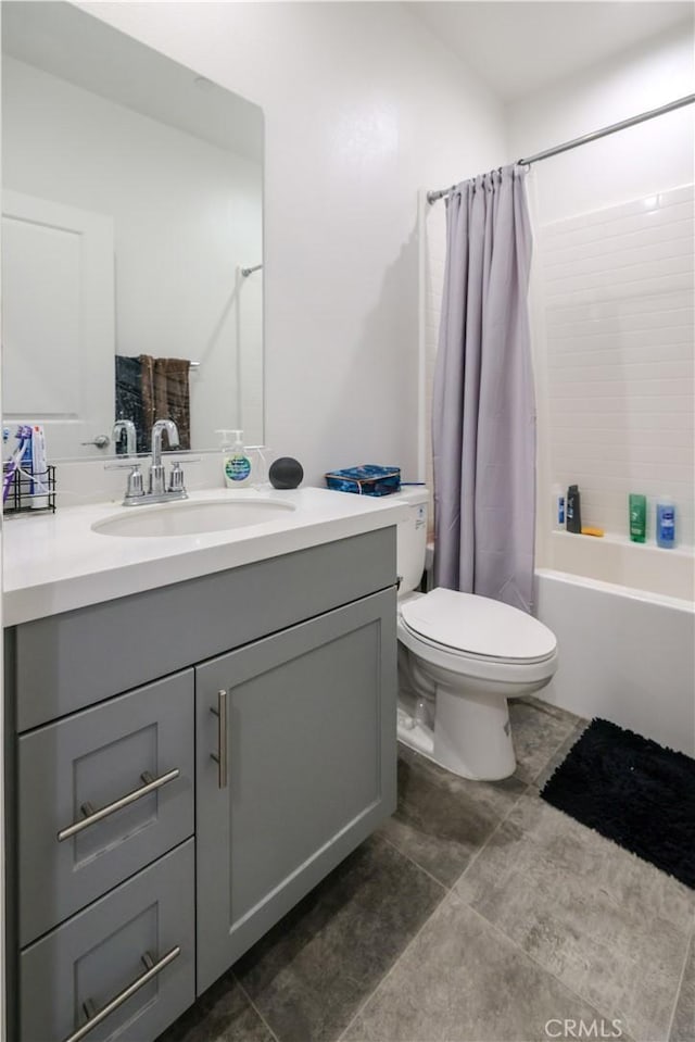 full bathroom featuring vanity, toilet, and shower / bathtub combination with curtain