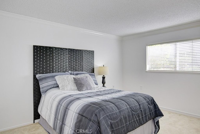 carpeted bedroom featuring crown molding and a textured ceiling