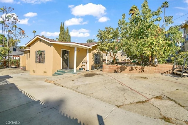 view of front of property with a patio area