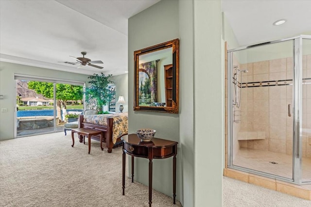 interior space featuring ceiling fan and light carpet