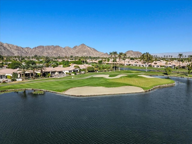 view of property's community featuring a water and mountain view