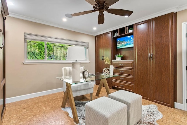 office area featuring ceiling fan and crown molding