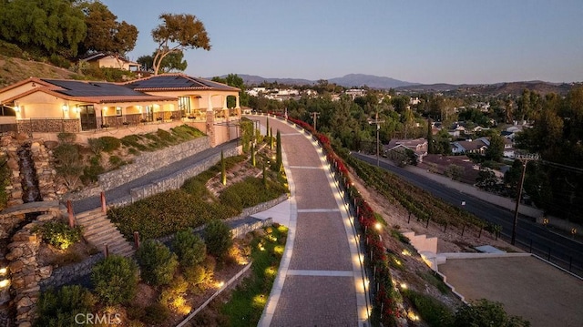 exterior space featuring a mountain view