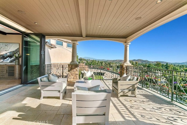 balcony featuring a mountain view