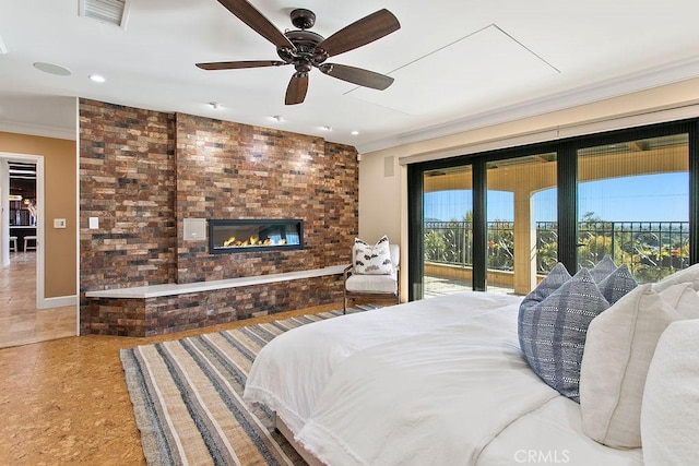 bedroom with tile patterned flooring, ceiling fan, access to exterior, ornamental molding, and a fireplace