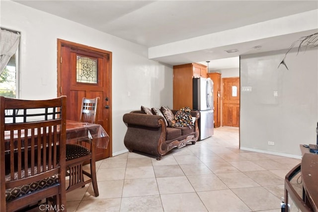 living room featuring light tile patterned flooring