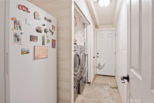 laundry area featuring washing machine and dryer