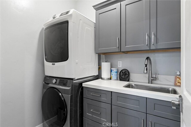 1486 Magadon Rd, Paradise, CA 95969 - laundry area with stacked washing machine and dryer and cabinet space