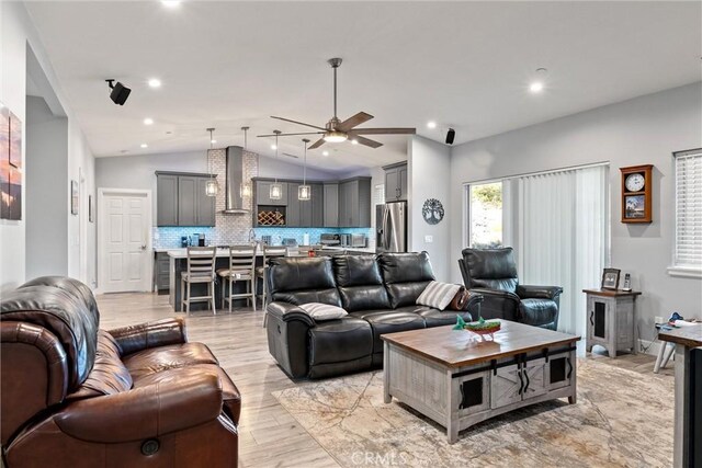 1486 Magadon Rd, Paradise, CA 95969 - living room featuring lofted ceiling, a ceiling fan, light wood-type flooring, and recessed lighting