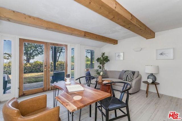 sunroom with beamed ceiling and french doors