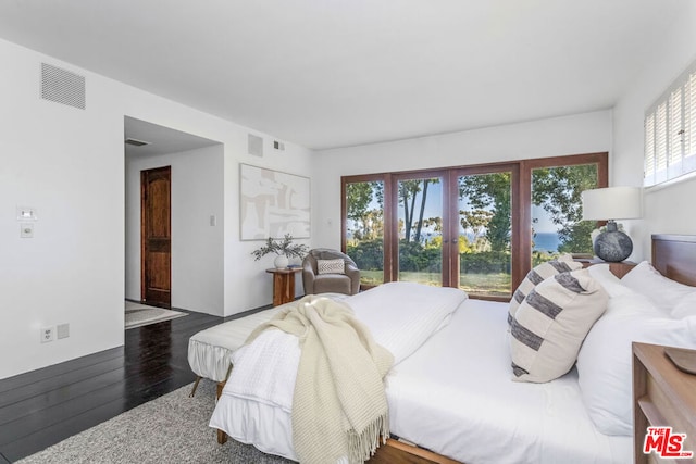 bedroom featuring hardwood / wood-style flooring