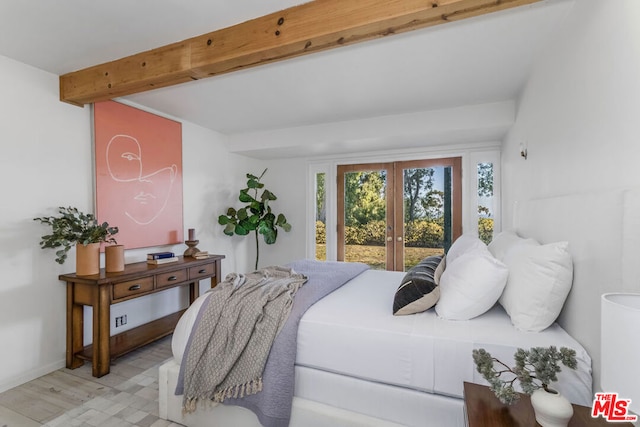 bedroom featuring french doors, light wood-type flooring, and beam ceiling